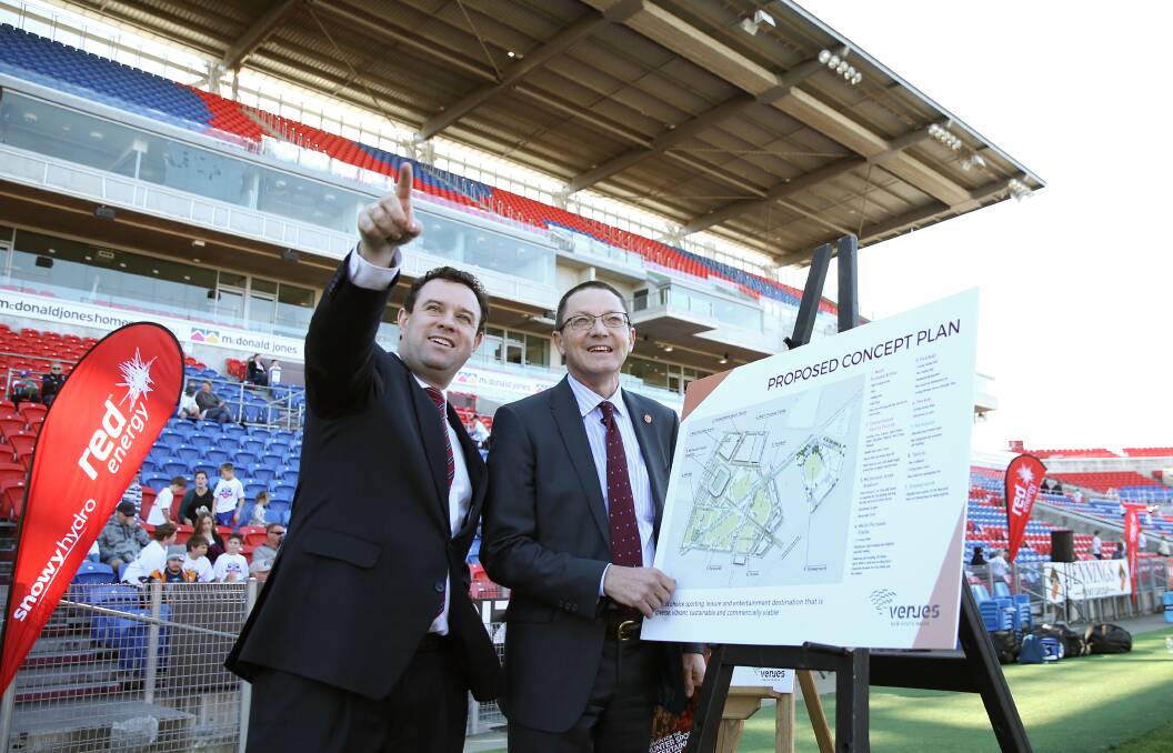 NSW sports minister Stuart Ayres and parliamentary secretary for the Hunter, Scot MacDonald, unveil the blueprint for the Broadmeadow sports and entertainment precinct in 2017. We're still waiting. Picture by Marina Neil