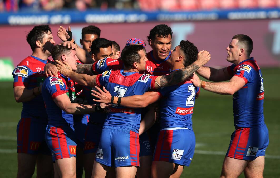 The Knights celebrate a try on Sunday. Picture: Simone De Peak