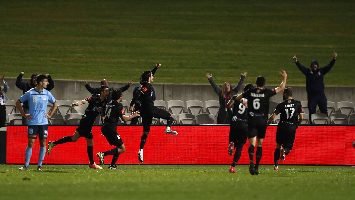 GOAL: Petratos celebrates his winner against Sydney FC.