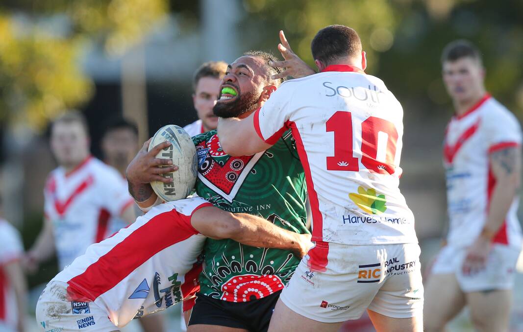 STRANGLEHOLD: Felise Taufaao of Wests objects to a tackle by South Newcastle at Harker Oval on Sunday. Picture: Max Mason-Hubers