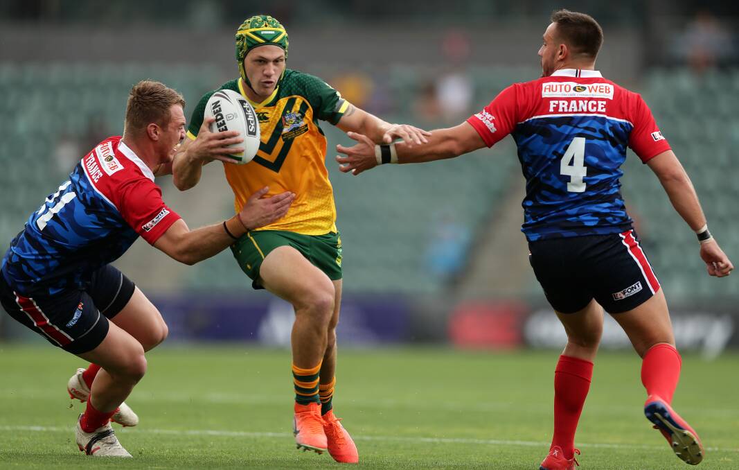 CLASS ABOVE: Newcastle's Kalyn Ponga played five-eighth for the Junior Kangaroos against France at WIN Stadium and was in sublime form, setting up four tries. Campbell Graham scored a hat-trick of tries for the home side. Picture: Getty Images