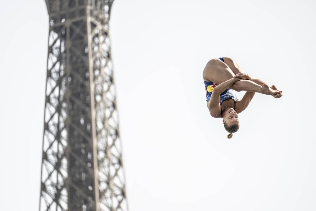 WHAT GOES UP: Iffland takes the plunge with the Eiffel Tower in the background.