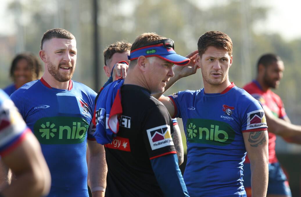 Knights coach Adam O'Brien with injured playmakers Kalyn Ponga and Jackson Hastings. Picture by Simone De Peak
