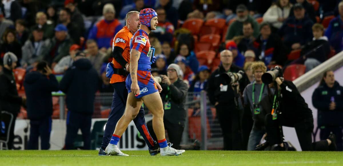 OVER AND OUT: Kalyn Ponga leaves the field on Friday night. Picture: Jonathan Carroll