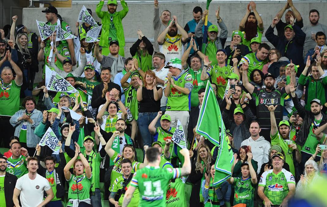 GREEN PARTY: Canberra's John Bateman salutes the fans after last week's win in Melbourne. They will enjoy home-ground advantage in next week's preliminary final. Picture: Getty Images