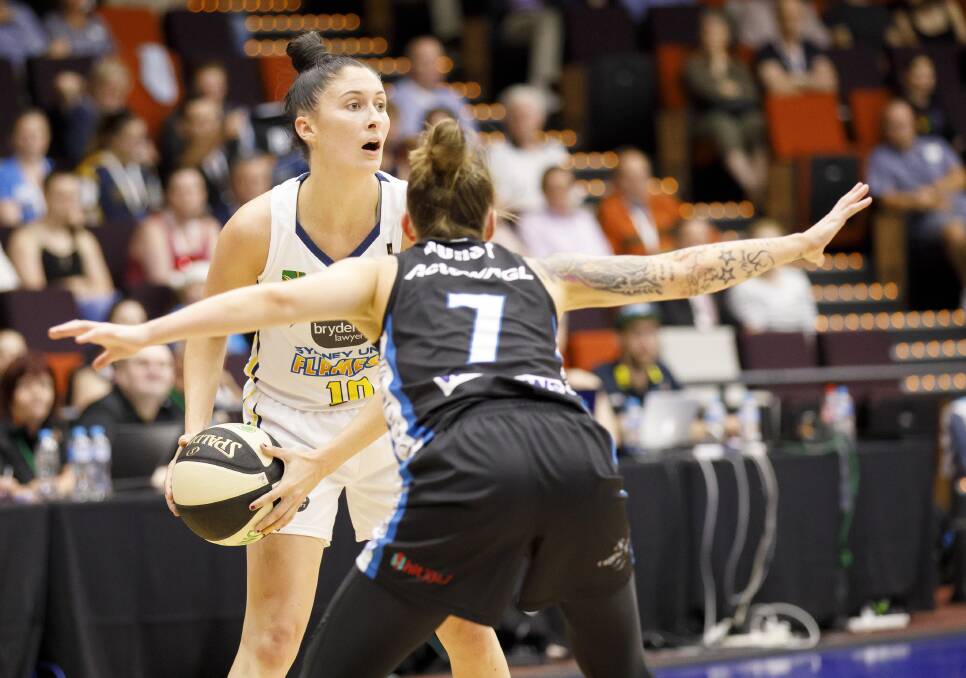 IN FORM: Katie-Rae Ebzery, pictured playing for the Sydney Flames, scored 28 points for the Perth Lynx against her former club. Picture: Sitthixay Ditthavong 