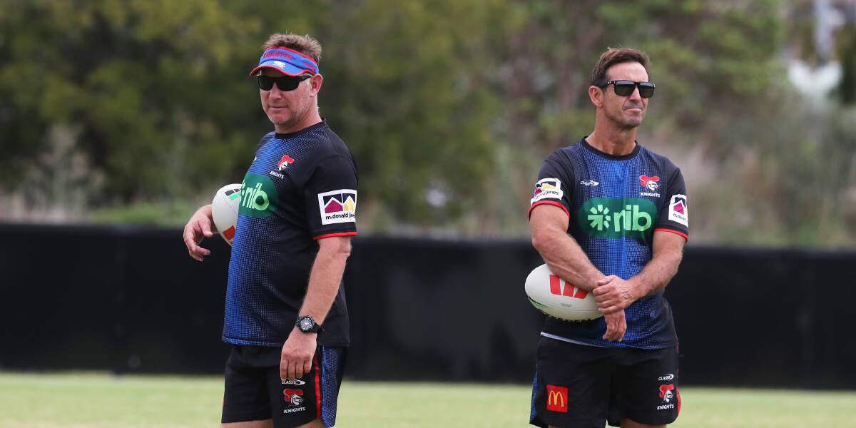 Knights coach Adam O'Brieb, left, and club legend Andrew Johns. Picture by Peter Lorimer