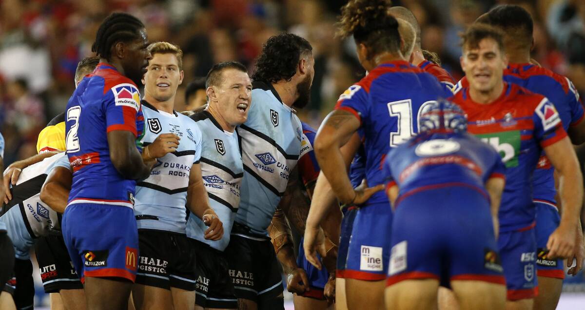 THE LAST WORD: Knights players wish Cronulla skipper Paul Gallen well in his swansong appearance at McDonald Jones Stadium. Picture: Jonathan Carroll