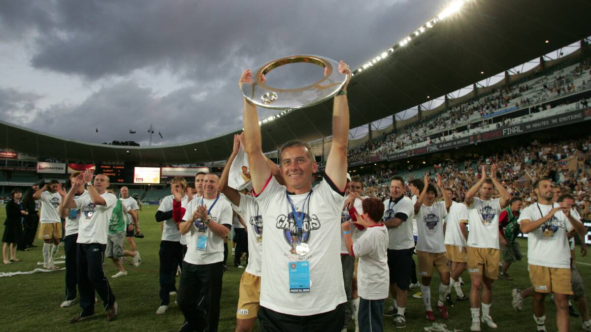 THOSE WERE THE DAYS: Gary van Egmond after the Jets 2008 grand final victory. Picture: Darren Pateman