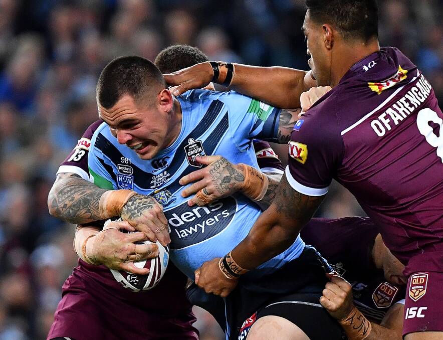 BLUE STEEL: NSW prop David Klemmer charges into the Queensland defence on Wednesday. It remains to be seen if he backs up against his former club, Canterbury.