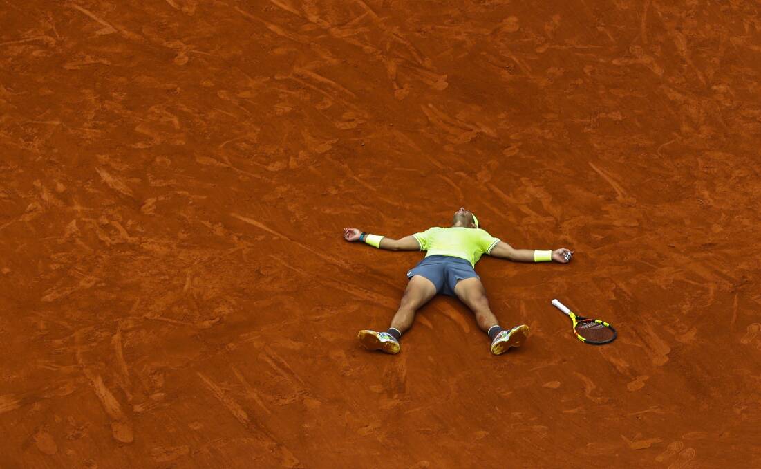 DONE AND DUSTED: Rafael Nadal after his victory at the French Open. Picture: AP