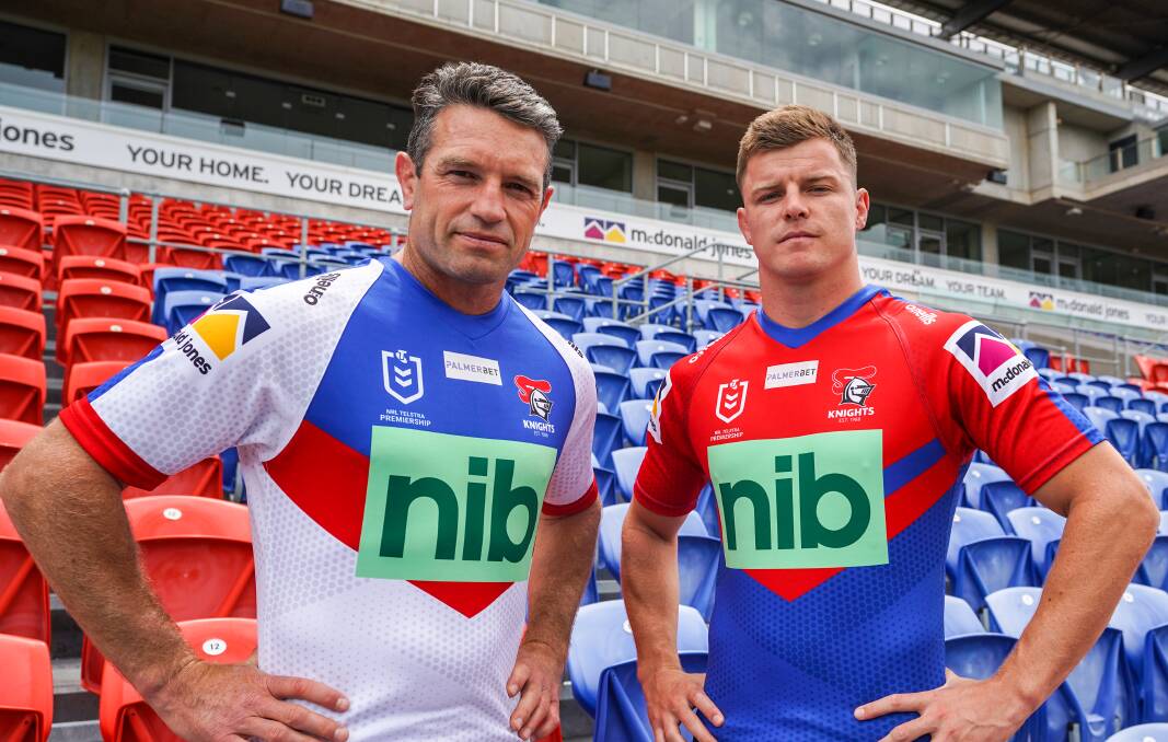 HOME AND AWAY: Knights legend Danny Buderus and co-captain Jayden Brailey model Newcastle's kits for 2022. Picture: Newcastle Knights Media