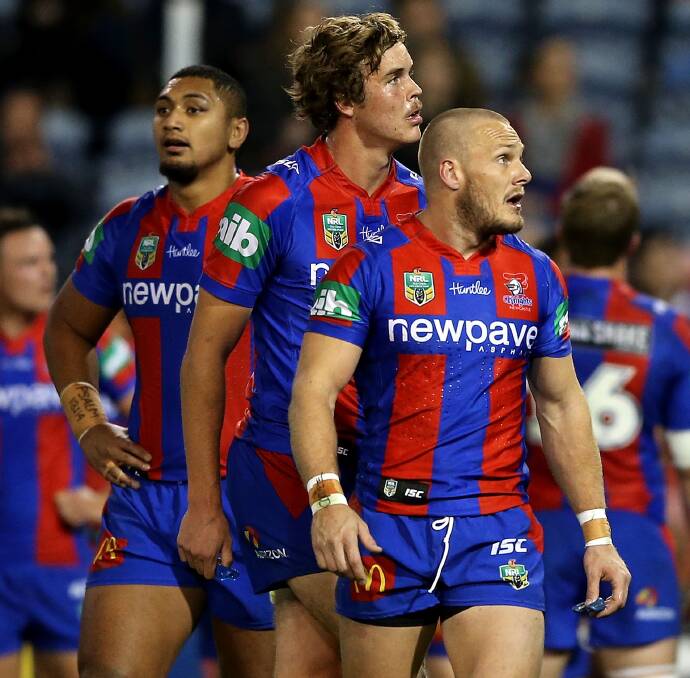 THE ODD COUPLE: Teenager Cory Denniss and Nathan Ross have quickly formed a combination on Newcastle's left edge. Picture: Getty Images