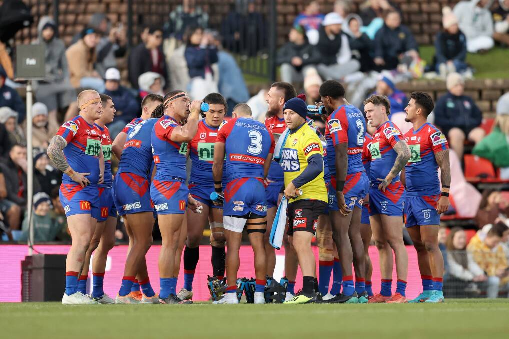 OUTGUNNED: The Knights regroup after another Penrith try. Picture: Getty Images