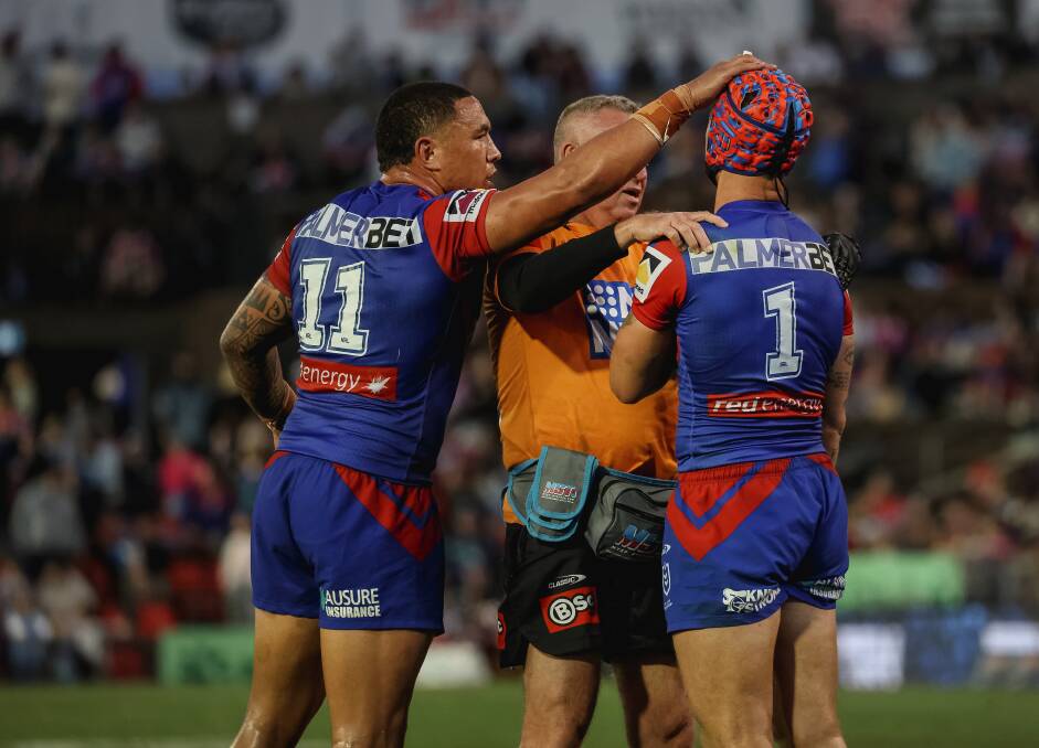 Teammate Tyson Frizell shows his concern for Kalyn Ponga after Newcastle's skipper was injured in a Jesse Ramien tackle. Picture by Peter Lorimer