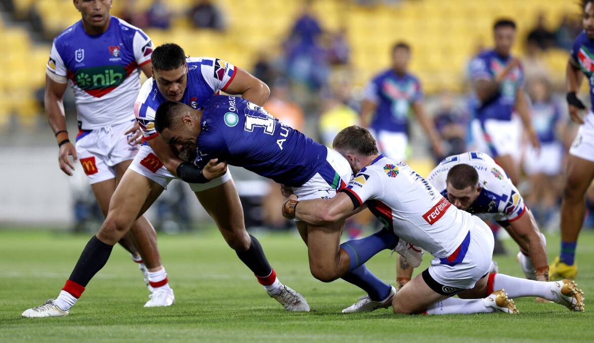  Marata Niukore of the Warriors charges forward against the Knights on Friday night. Picture by Getty Images