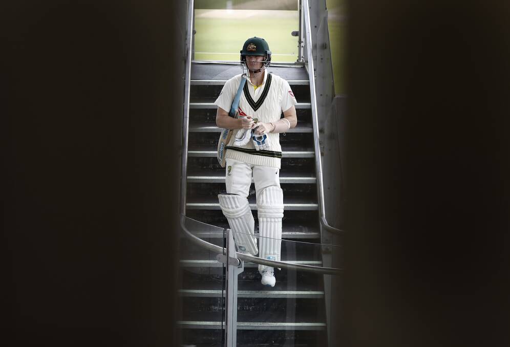 STAIRWAY TO HEAVEN: Steve Smith on his way out to bat at Old Trafford. He has dominated England's bowlers throughout the Ashes. Picture: Getty Images