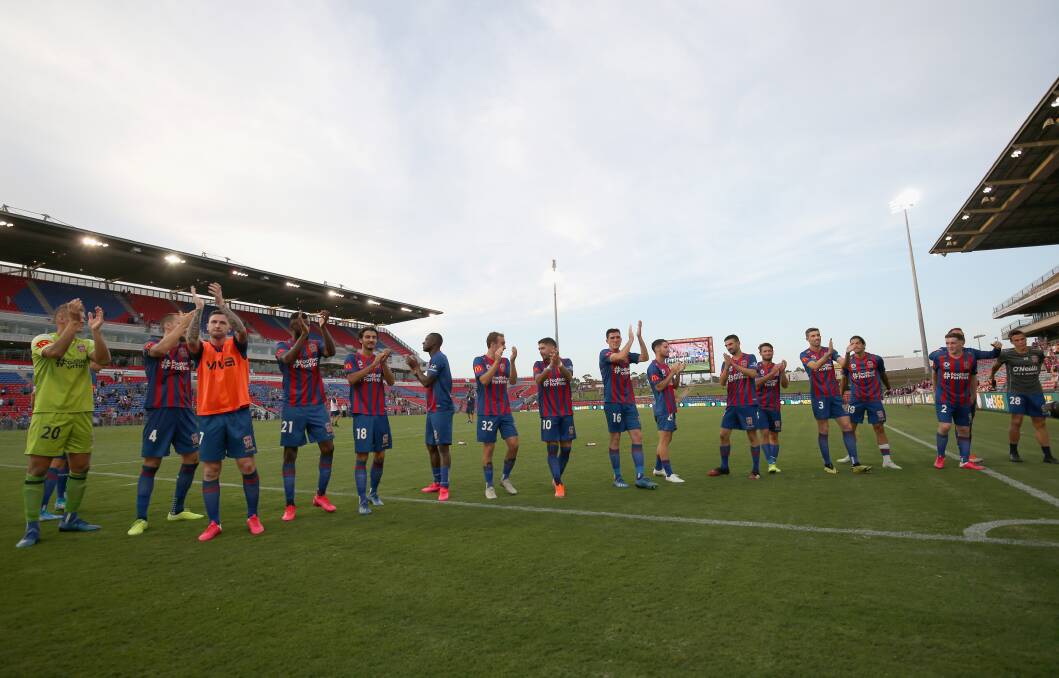 HEALTHY RESPECT: Jets players thank their fans after the recent win against Perth Glory. Picture: Getty Images