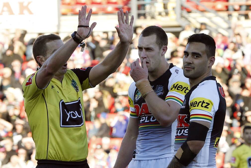 YOU TOO: Referee Cummins sin-bins Penrith pivot Tyrone May for his role in a brawl late in the second half. Picture: Darren Pateman, AAP