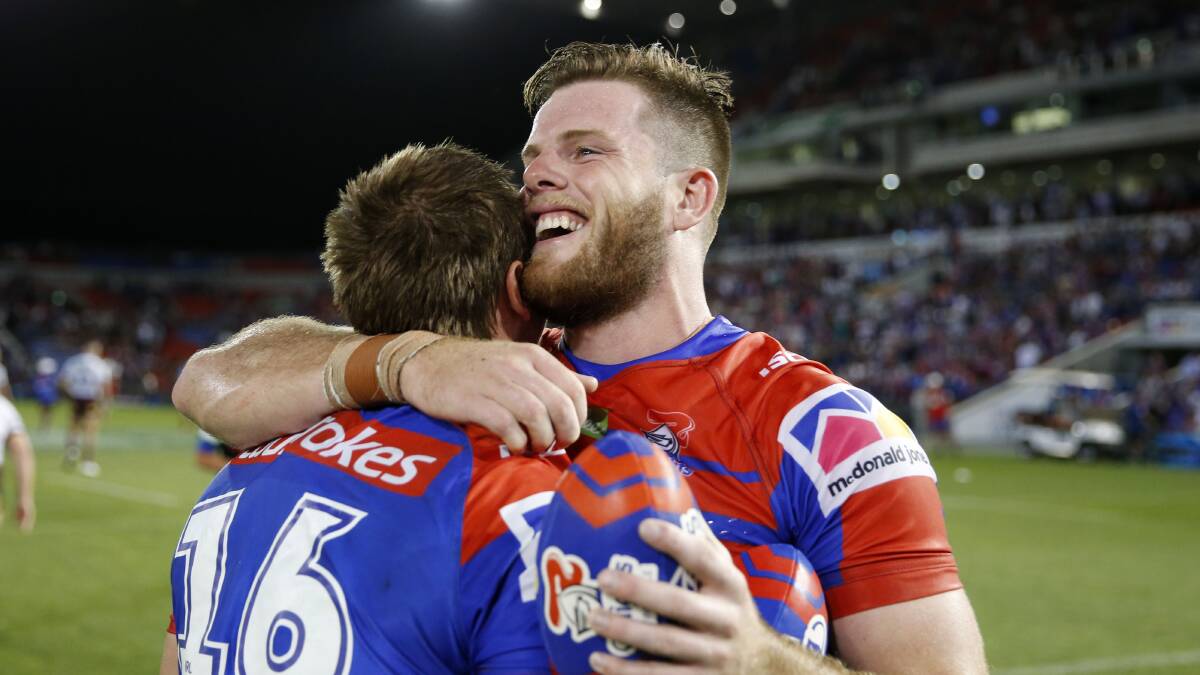 WINNERS ARE GRINNERS: Knights back-rower Lachlan Fitzgibbon and Jamie Buhrer celebrate Friday's win against Manly. Picture: AAP