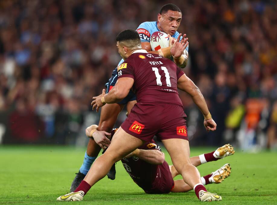 Tyson Frizell braces for impact as Queensland's David Fifita arrives to tackle him in Origin II. Picture Getty Images