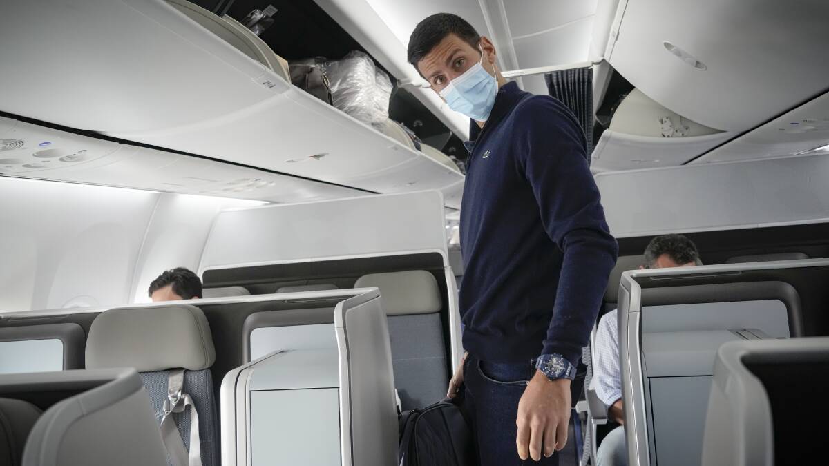 BLINDSIDED: Novak Djokovic on his flight home to Serbia after being deported from Australia. Will he ever return? Picture: Darko Bandic, AAP