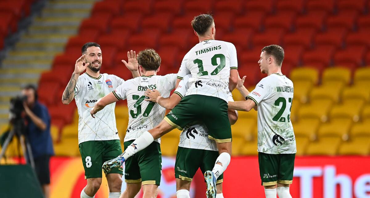 The Jets celebrate as Apostolos Stamatelopoulos, left, equals the club record for most goals in a season. Picture Getty Images