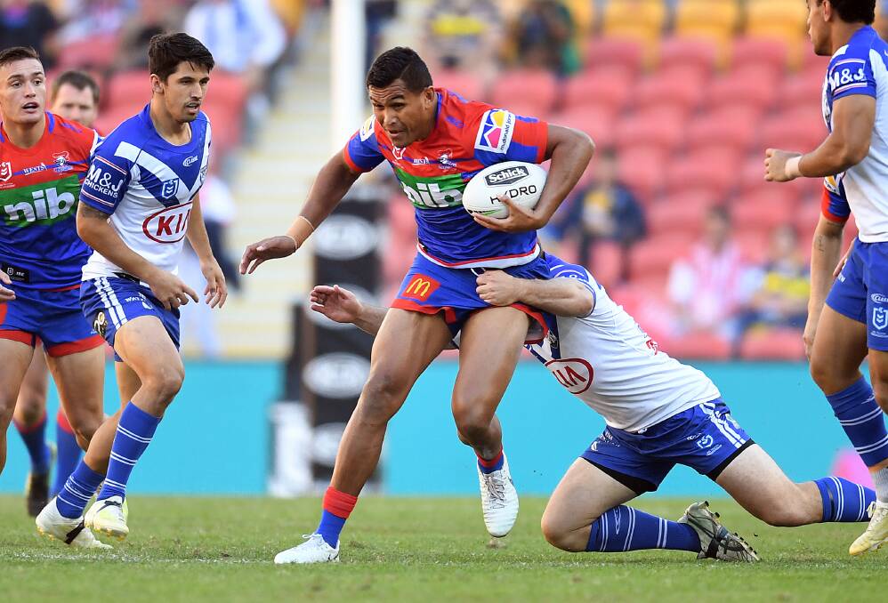 POWER AND PASSION: Daniel Saifiti hits it up against Canterbury at Suncorp Stadium. Picture: AAP