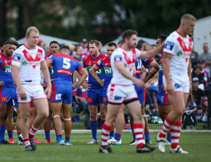 SLIPPING AWAY: St George-Illawarra players celebrate another try during their breakthrough third quarter against the Knights at Maitland on Saturday. Pictures: Marina Neil 