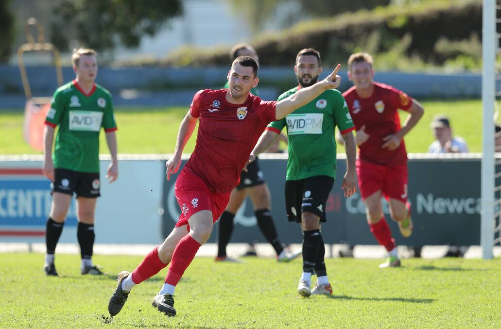 Jacob Dowse celebrates after netting a goal for Broadmeadow Magic. The 22-year-old is on a scholarship deal at Perth Glory and is getting his body ready to handle the rigours of the A-League. Picture by Max Mason-Hubers