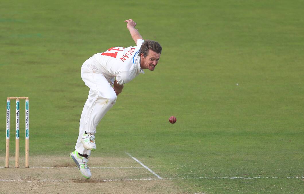 STILL GOING STRONG: Michael Hogan sends one down for Glamorgan. Picture: Getty Images