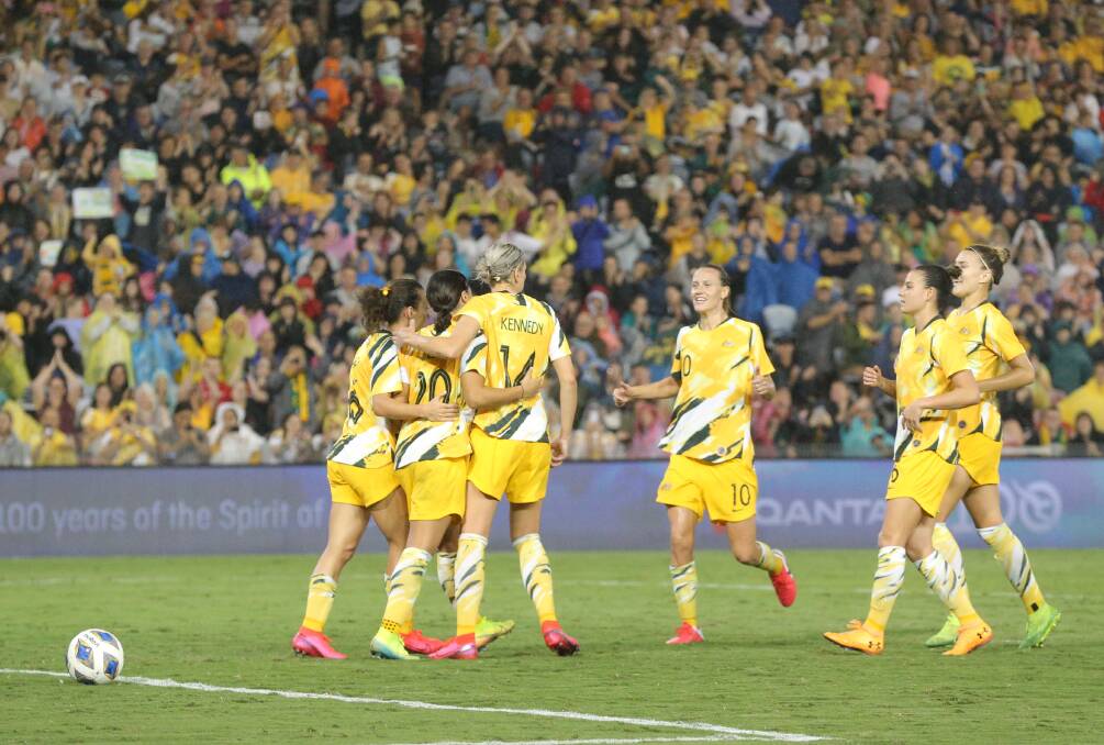 CROWDED HOUSE: The Matildas celebrate a goal in the 5-0 rout of Vietnam in an Olympic qualifier in Newcastle in March. McDonald Jones Stadium would be one of 13 stadiums used if the joint Australia-New Zealand bid win the rights to host the 2023 women's World Cup. Picture: Max Mason-Hubers