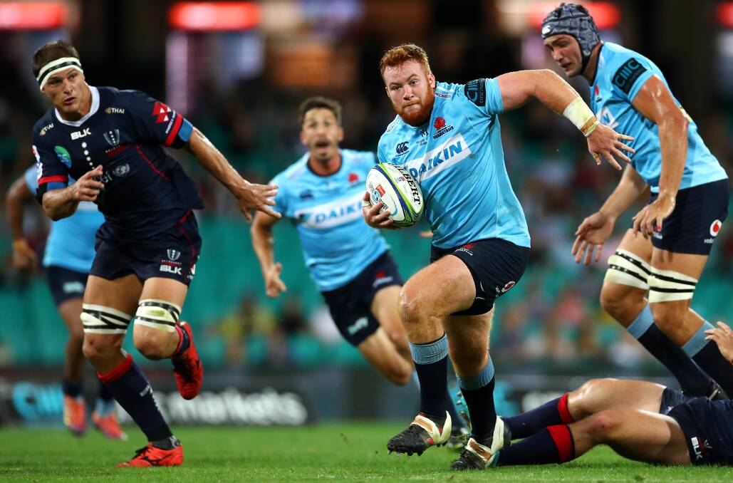 ON THE CHARGE: Harry Johnson-Holmes hits the ball up for the Waratahs against the Rebels. Picture: Getty Images