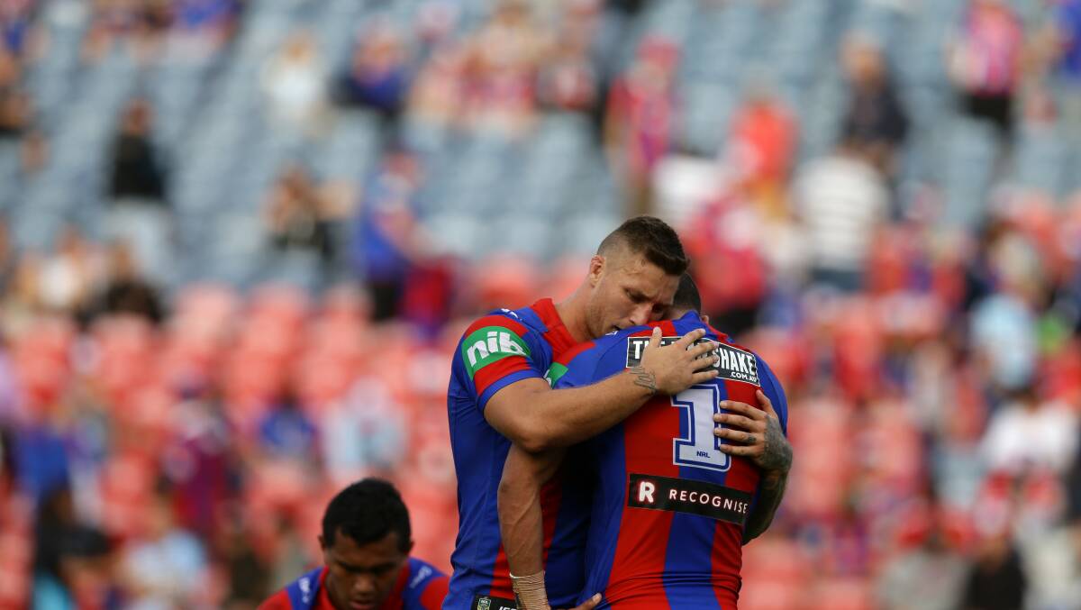 FLASHBACK: Tariq Sims consoles Dane Gagai after a 62-0 hammering from Cronulla in 2016.