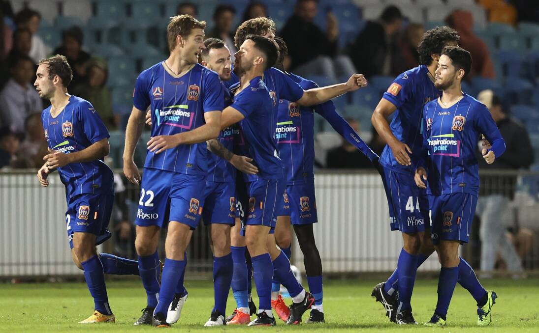 GOAL: The Jets celebrate Roy O'Donovan's penalty goal. Picture: Getty Images