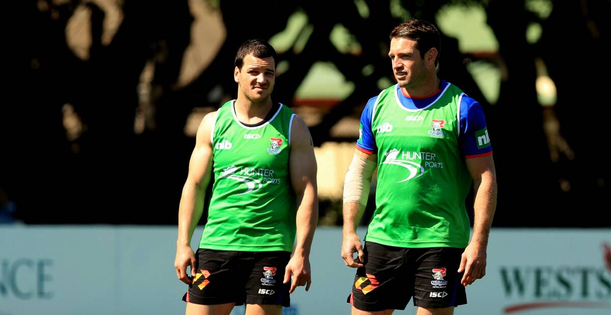 BROTHERS IN ARMS: Jarrod Mullen and Danny Buderus at training with the Knights in 2013, the season in which they won two play-offs together. Picture: Simone De Peak