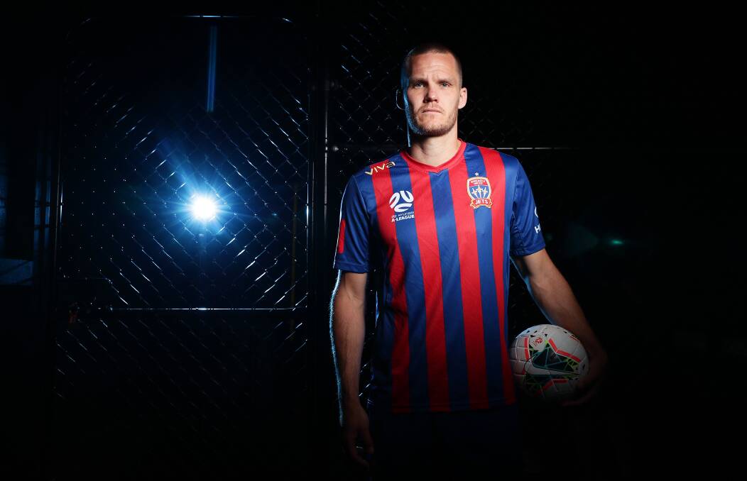 SPACE TO LET: Jets skipper Nigel Boogaard models the club's unbranded home kit. Picture: Getty Images