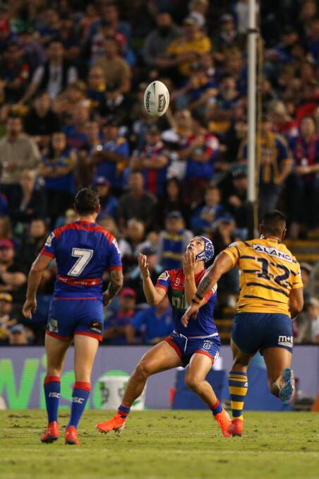 TARGET: Kalyn Ponga waits to catch a bomb against Parramatta. Picture: Max Mason-Hubers