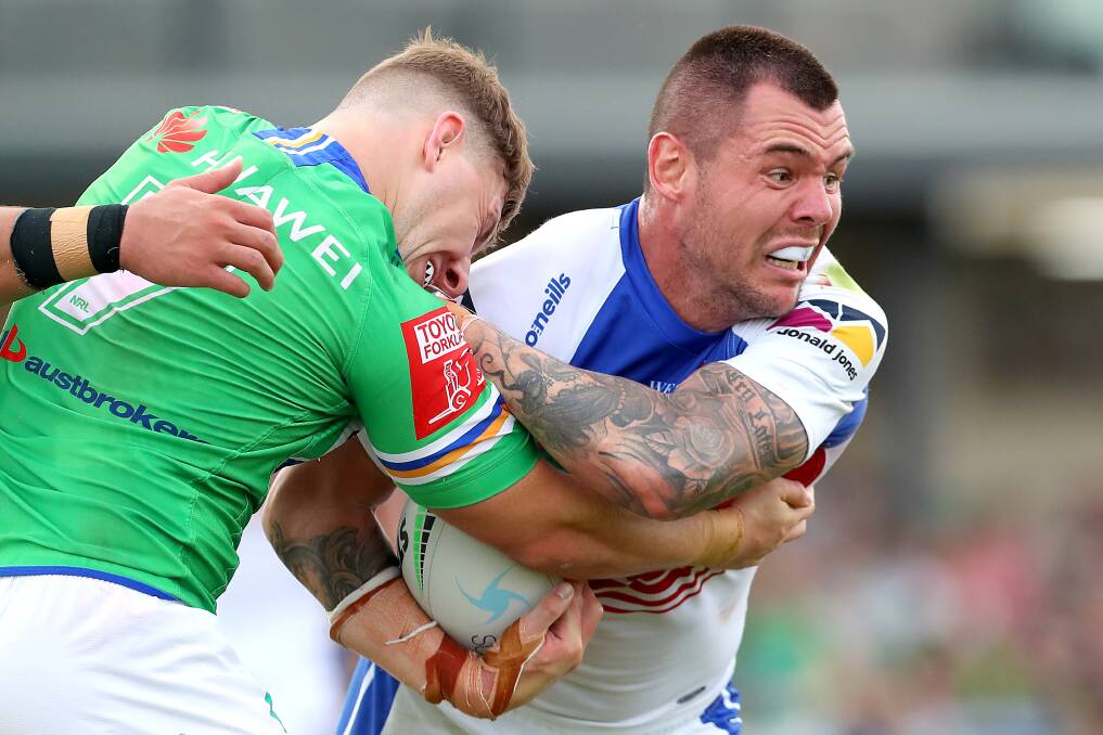 WRAPPED UP: George Williams tackles David Klemmer. Picture: Getty Images