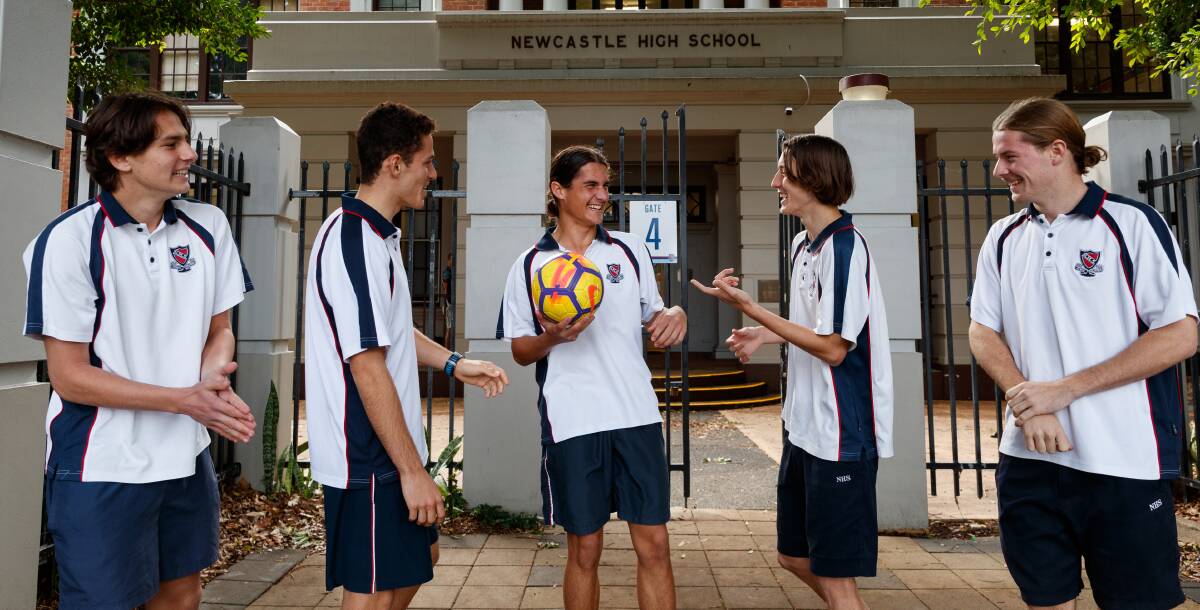 BOY BANTER: Jets' rising star Archie Goodwin with mates Nicholas Kacev, Oscar Crakanthorp, Riley Parker and Charlie Kelly at Newcastle High School. Picture: Max Mason-Hubers