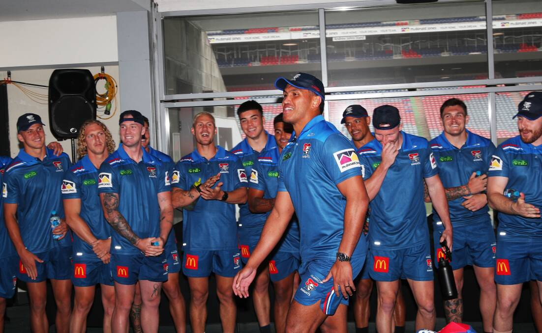 Newcastle players applaud Jacob Saifiti after he re-signed with the Knights for three seasons. Picture by Peter Lorimer