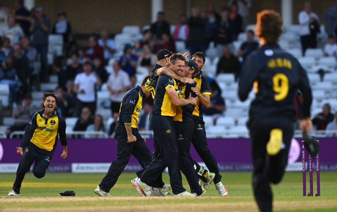 Michael Hogan's Glamorgan teammates mob him after winning the Royal London Cup (50-over) final in 2021. Picture: Getty Images