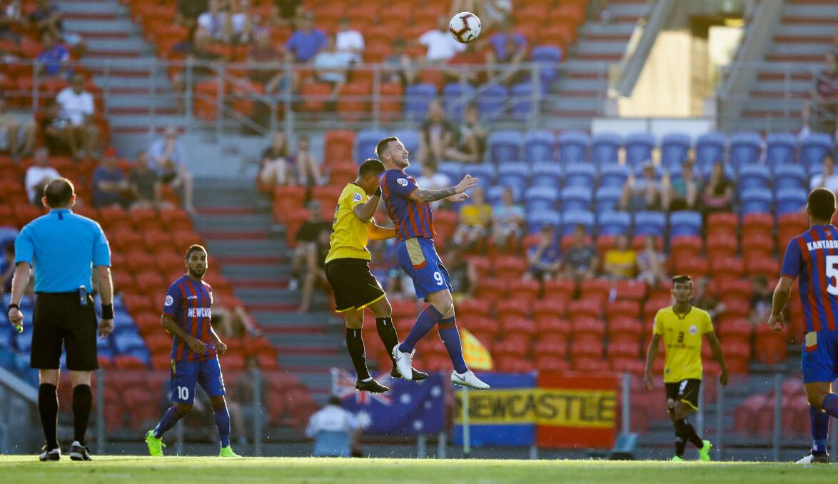 RARE AIR: Jets striker Roy O'Donovan launches himself for a header. The Irish striker has been a frustrated spectator during the A-League finals. Picture: Jonathan Carroll