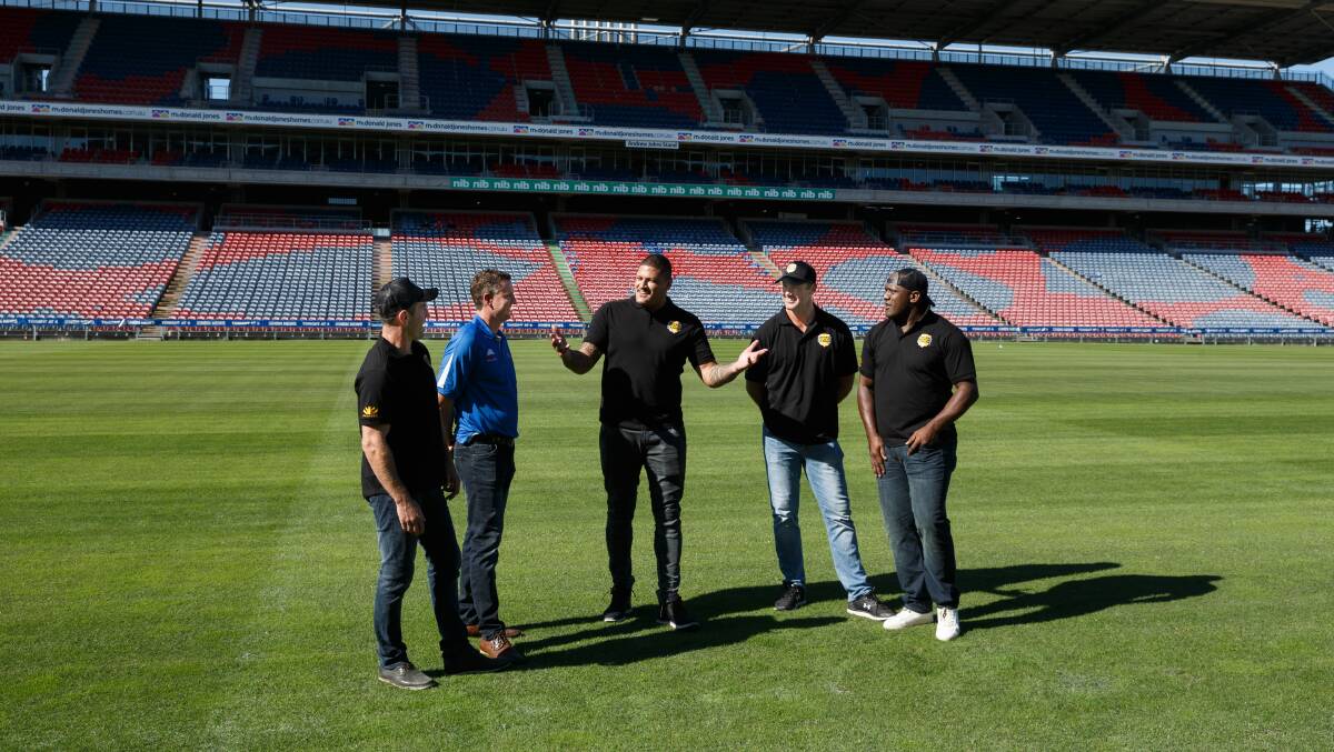 BLAST FROM THE PAST: Danny Buderus, Mark Hughes, Willie Mason, Trent Waterhouse and Wendell Sailor discuss the Legends of League tournament. Picture: Max Mason-Hubers