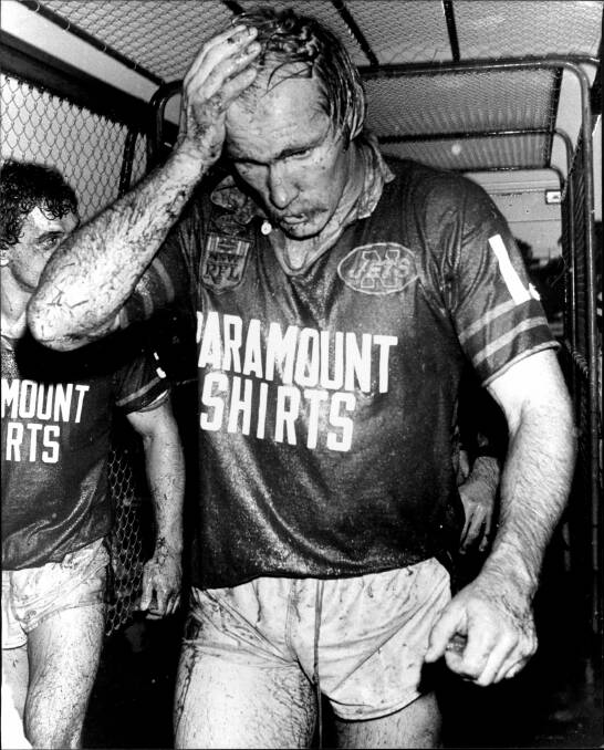 OLD SCHOOL: Geoff Coburn after playing for Newtown in a quagmire.