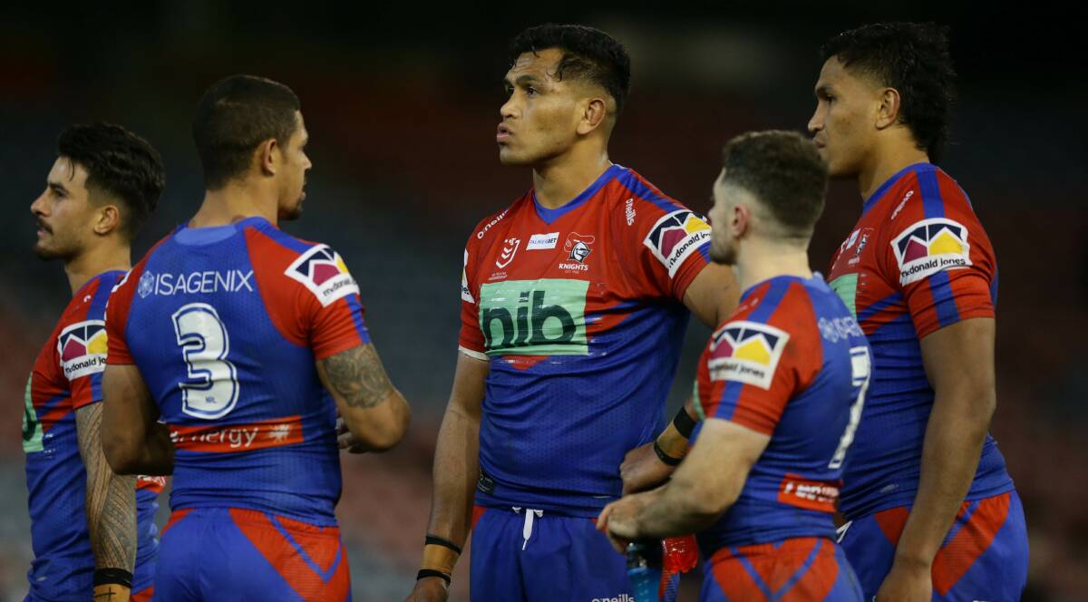 DISAPPOINTED: The Knights ponder another Roosters try. Picture: Jonathan Carroll
