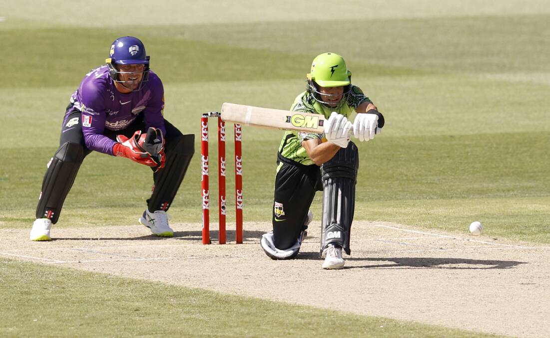 MORE RUNS: Sangha sweeps against Hobart. Picture: Getty Images