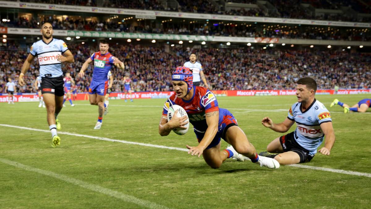 TRY TIME: Kalyn Ponga scores for Newcastle. Picture: Jonathan Carroll