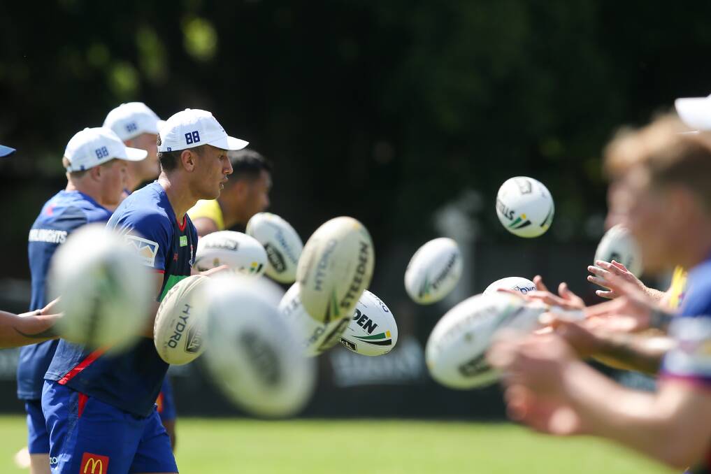 JUGGLING ACT: Newcastle's players work on their handling skills. Picture: Max Mason Hubers