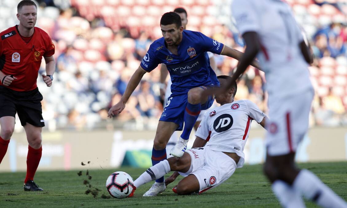 FOCUSED: Steve Ugarkovic says the Newcastle Jets will keep giving 100 per cent until full-time sounds in their final game this season. Picture: Darren Pateman, AAP